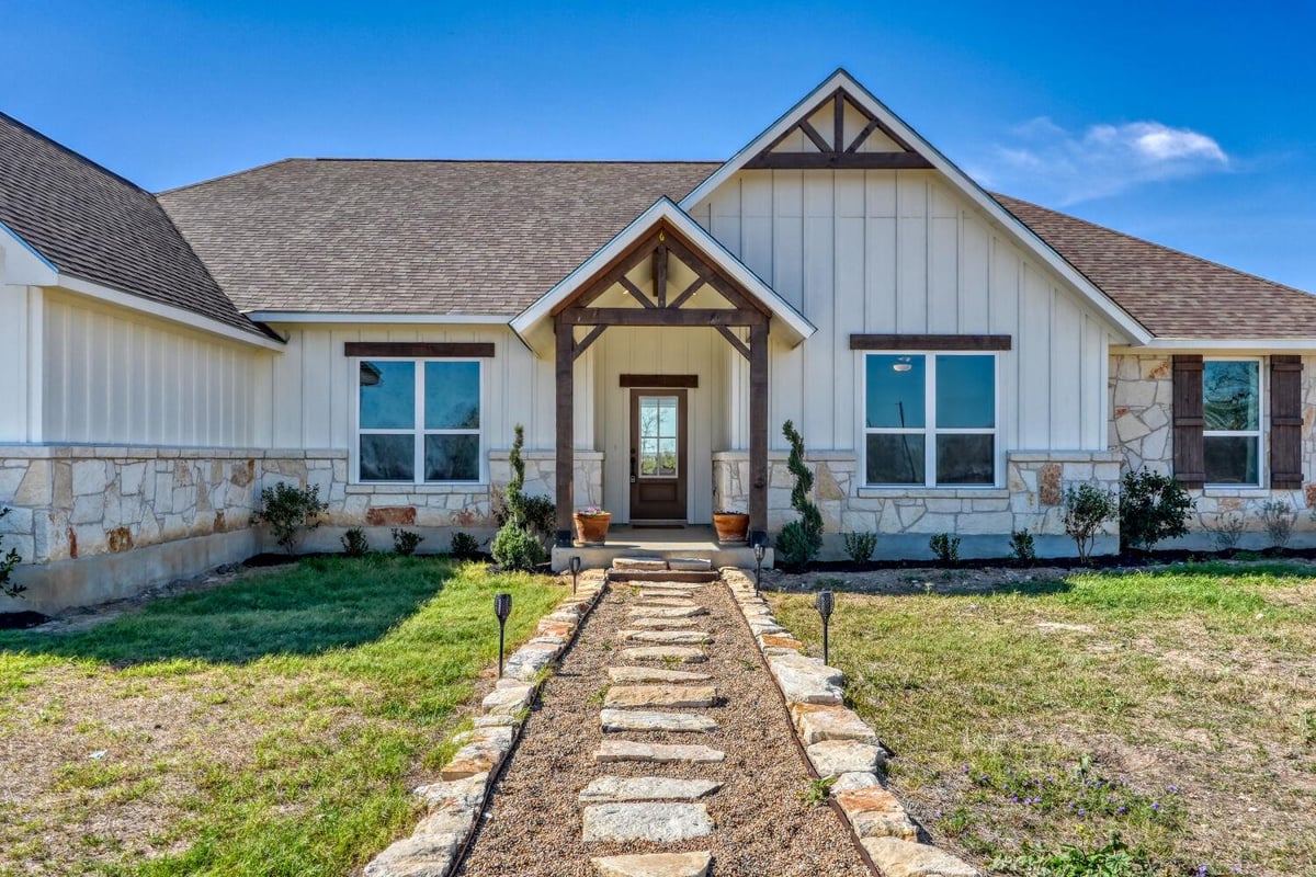 View 1642 Scull Rd in Enchanted Ranch 1642 Scull Rd - front exterior - Luxury home in Enchanted Ranch, San Marcos, TX