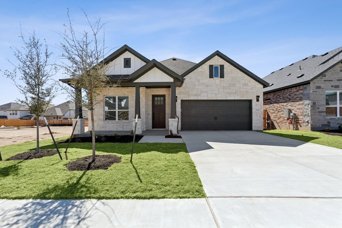 View 165 Bishop Wood Rd in Heritage 165 Bishop Wood Rd - front exterior - Luxury home in Heritage, Dripping Springs, TX
