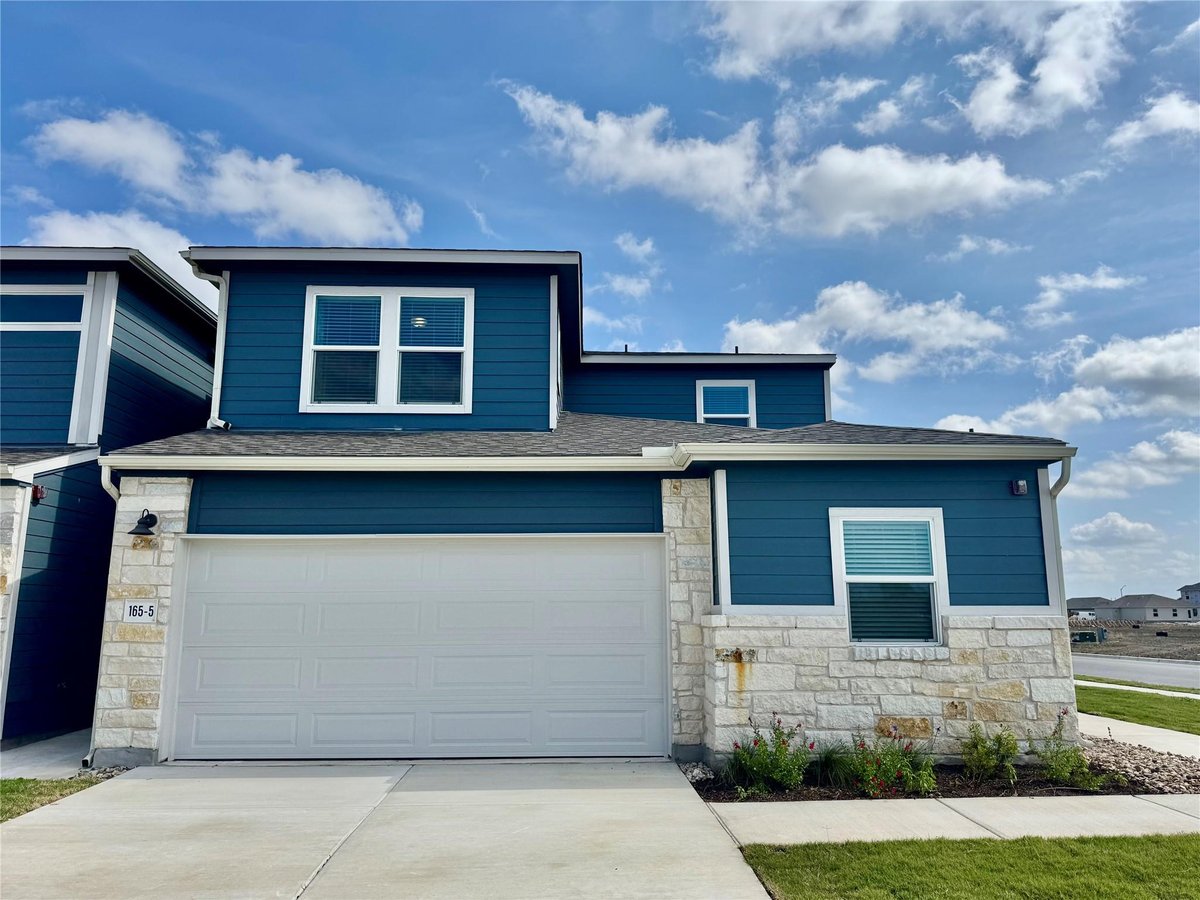 View 165 Calcite Rd Unit #5 in Waterstone Village 165 Calcite Rd Unit #5 - front exterior - Luxury home in Waterstone Village, Kyle, TX