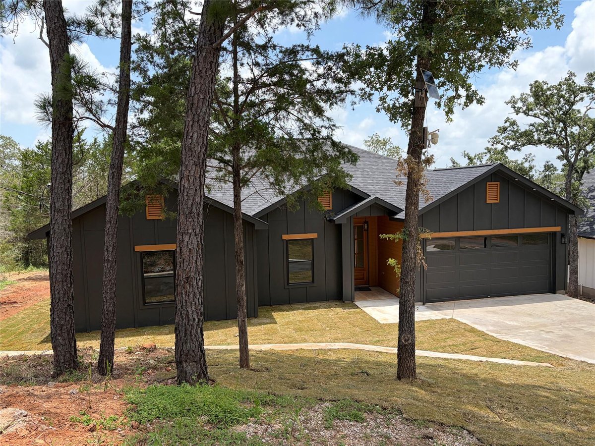 View 165 Lamaloa LN in Tahitian Village 165 Lamaloa LN - property photo 1 - Luxury home in Tahitian Village, Bastrop, TX