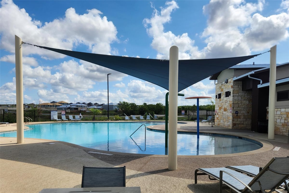 View 165 Santa Rosa LN in Prairie Lakes Ph 1 Sec 2 165 Santa Rosa LN - property photo 1 - Luxury home in Prairie Lakes Ph 1 Sec 2, Buda, TX