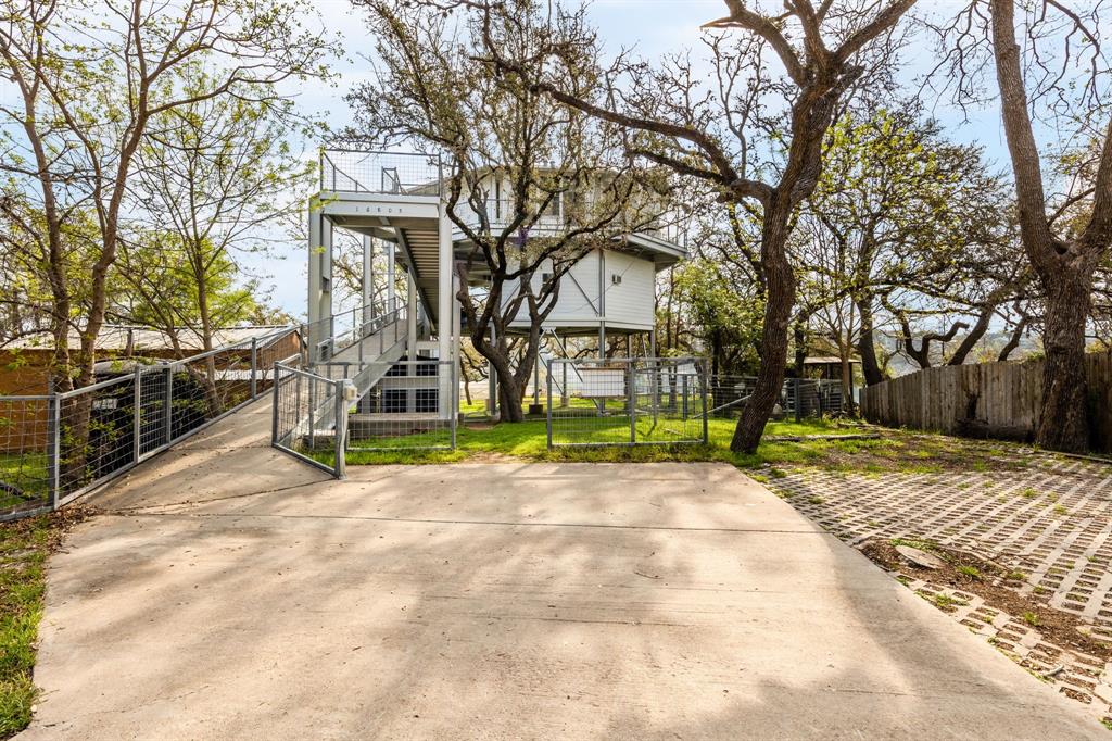 View 16805 Hurst Creek Cir in McDonald J 16805 Hurst Creek Cir - front exterior - Luxury home in McDonald J, Austin, TX