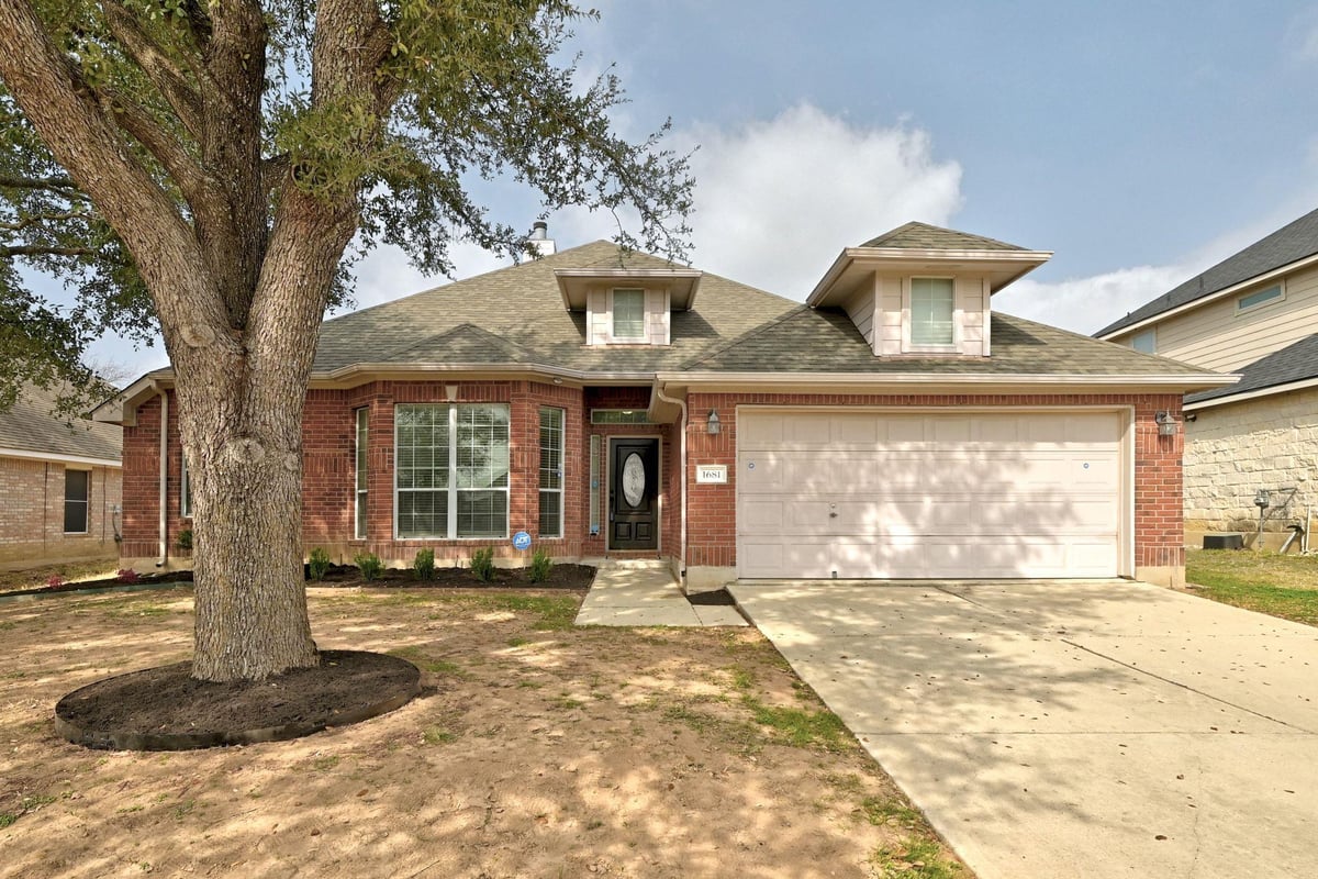 View 1681 Amberwood Loop in Amberwood Ph One 1681 Amberwood Loop - property photo 1 - Luxury home in Amberwood Ph One, Kyle, TX
