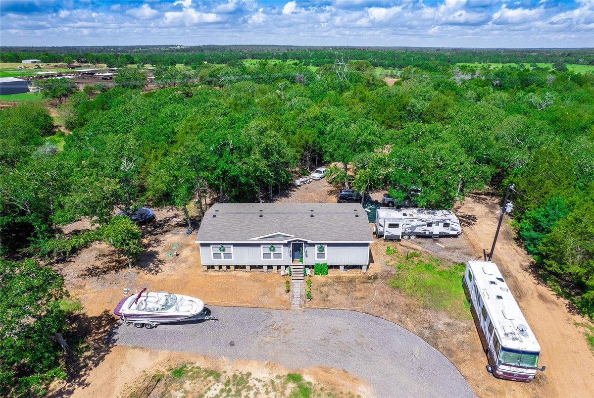 View 1686 FM 2104 in McCollum, Elias 1686 FM 2104 - front exterior - Luxury home in McCollum, Elias, Paige, TX