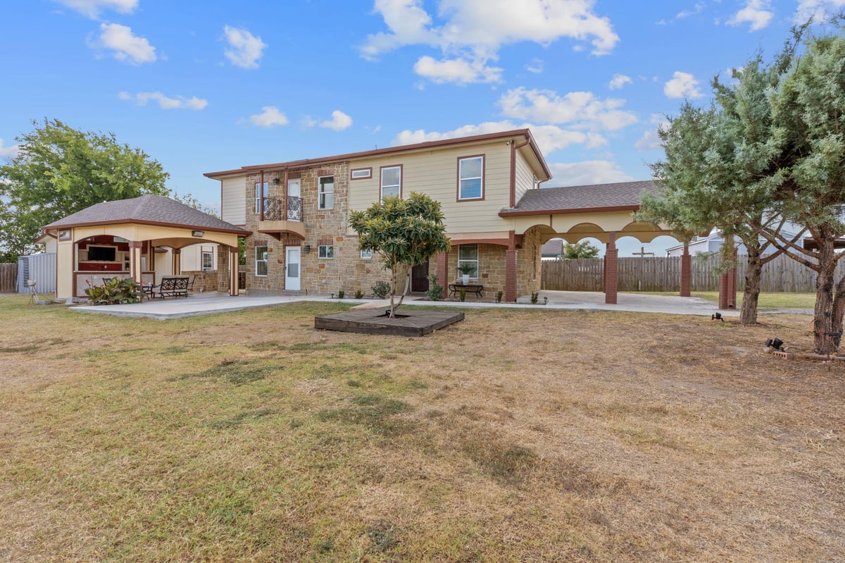 View 169 Ridgetop Rd in Satterwhite Ridge 169 Ridgetop Rd - front exterior - Luxury home in Satterwhite Ridge, Buda, TX