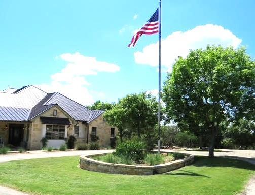 View 169 Royal Oaks Hill in Royal Oaks 169 Royal Oaks Hill - front exterior - Luxury home in Royal Oaks, Fredericksburg, TX