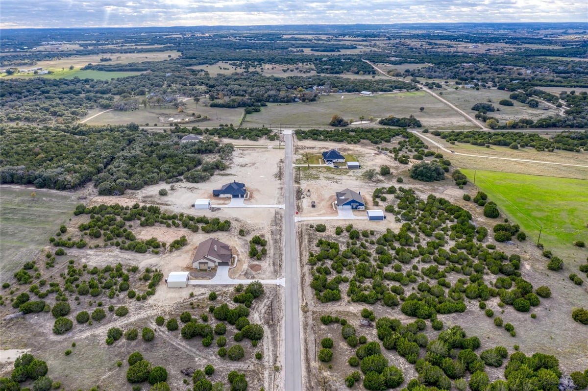 View 169 Whispering Wind Rd in Whispering Wind 169 Whispering Wind Rd - front exterior - Luxury lot in Whispering Wind, Bertram, TX