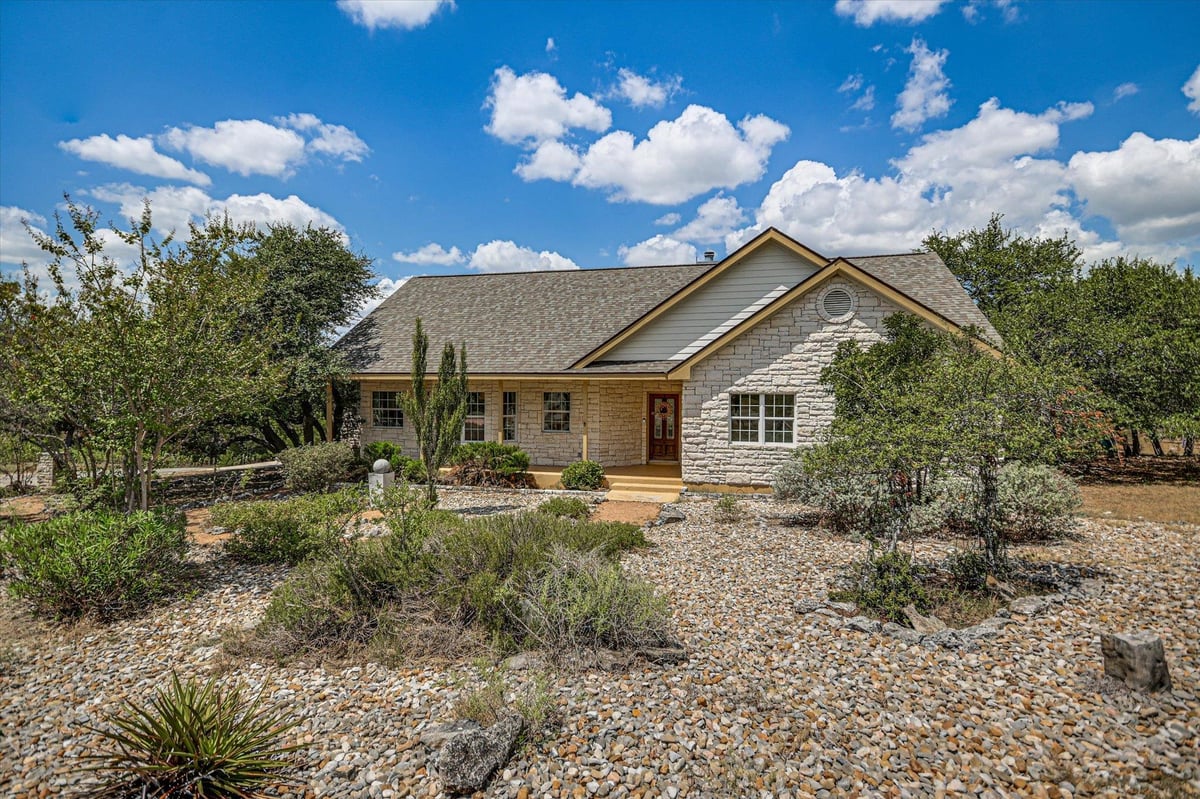 View 17 Falling Leaf LN in Woodcreek Sec 15 17 Falling Leaf LN - property photo 1 - Luxury home in Woodcreek Sec 15, Wimberley, TX