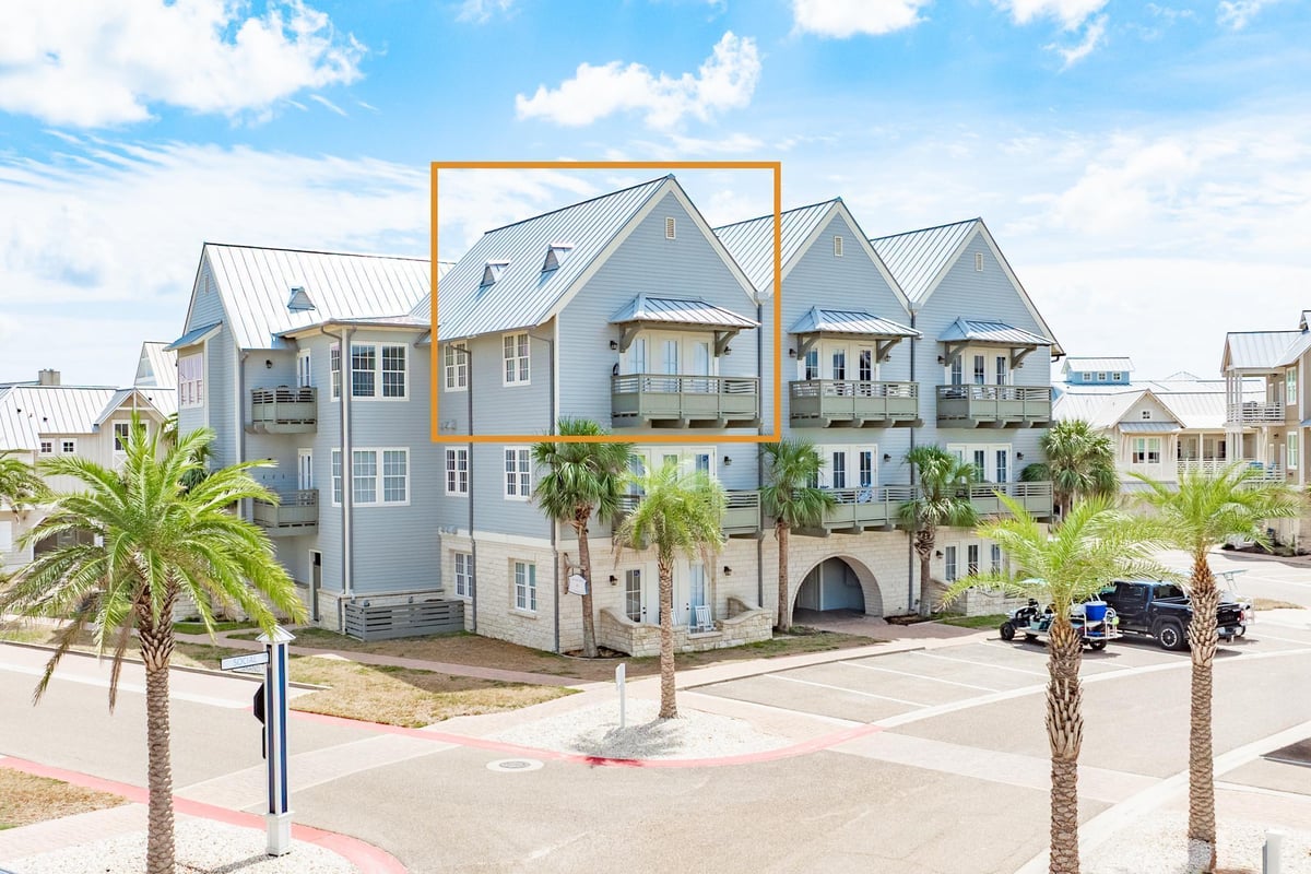 View 170 Social Cir Unit #11 in CINNAMON SHORE 170 Social Cir Unit #11 - front exterior - Luxury home in CINNAMON SHORE, Port Aransas, TX