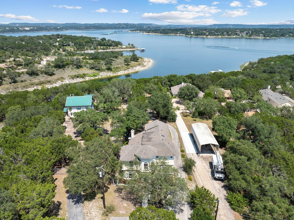 View 17004 Sleepy Hollow Dr in Lodge Acres 17004 Sleepy Hollow Dr - front exterior - Luxury home in Lodge Acres, Lago Vista, TX