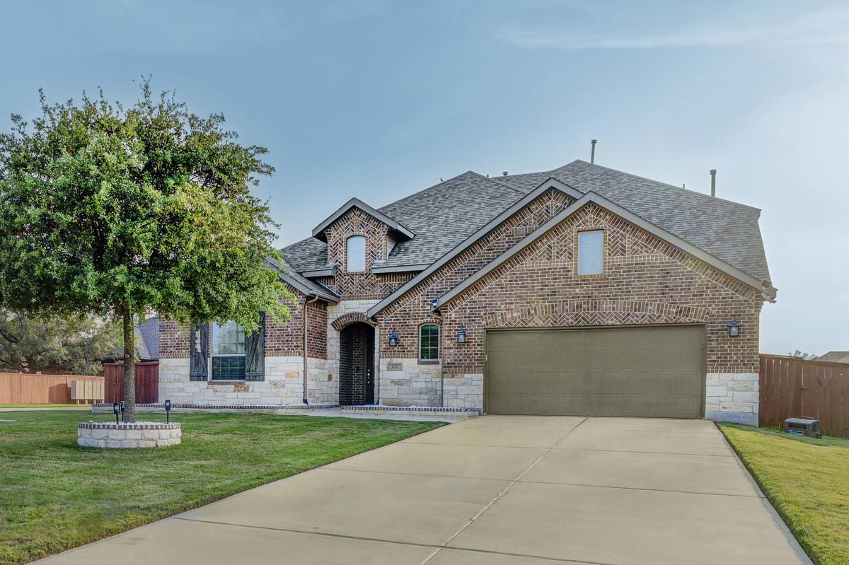 1701 Highland Ridge Rd - front exterior - Luxury home in OAKS AT SAN GABRIEL, Georgetown, TX