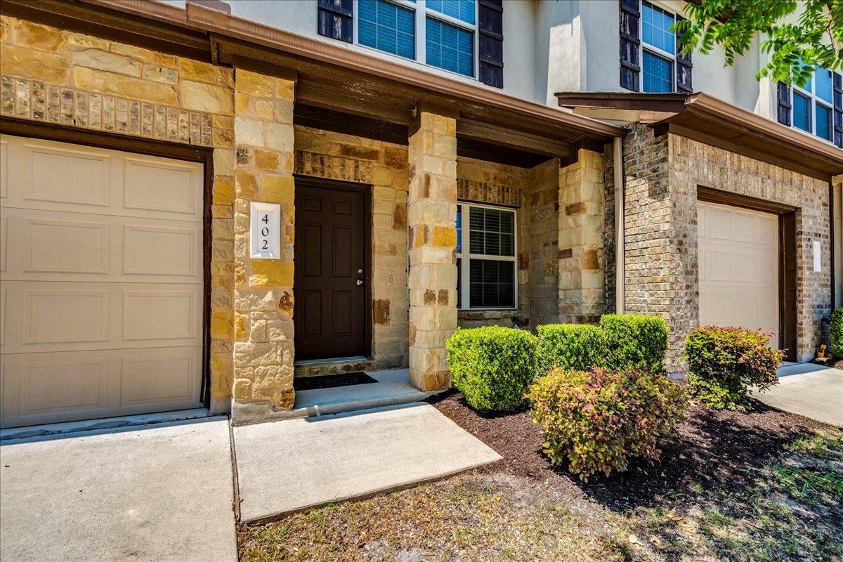 View 1701 S Bell Blvd Unit #402 in Cedar Park Villas Condo 1701 S Bell Blvd Unit #402 - front exterior - Luxury home in Cedar Park Villas Condo, Cedar Park, TX