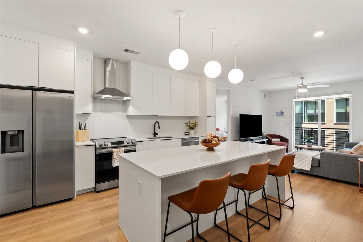View 1701 Simond Ave Unit #305 in Parkside/Mueller Condos 1701 Simond Ave Unit #305 - front exterior - Luxury home in Parkside/Mueller Condos, Austin, TX