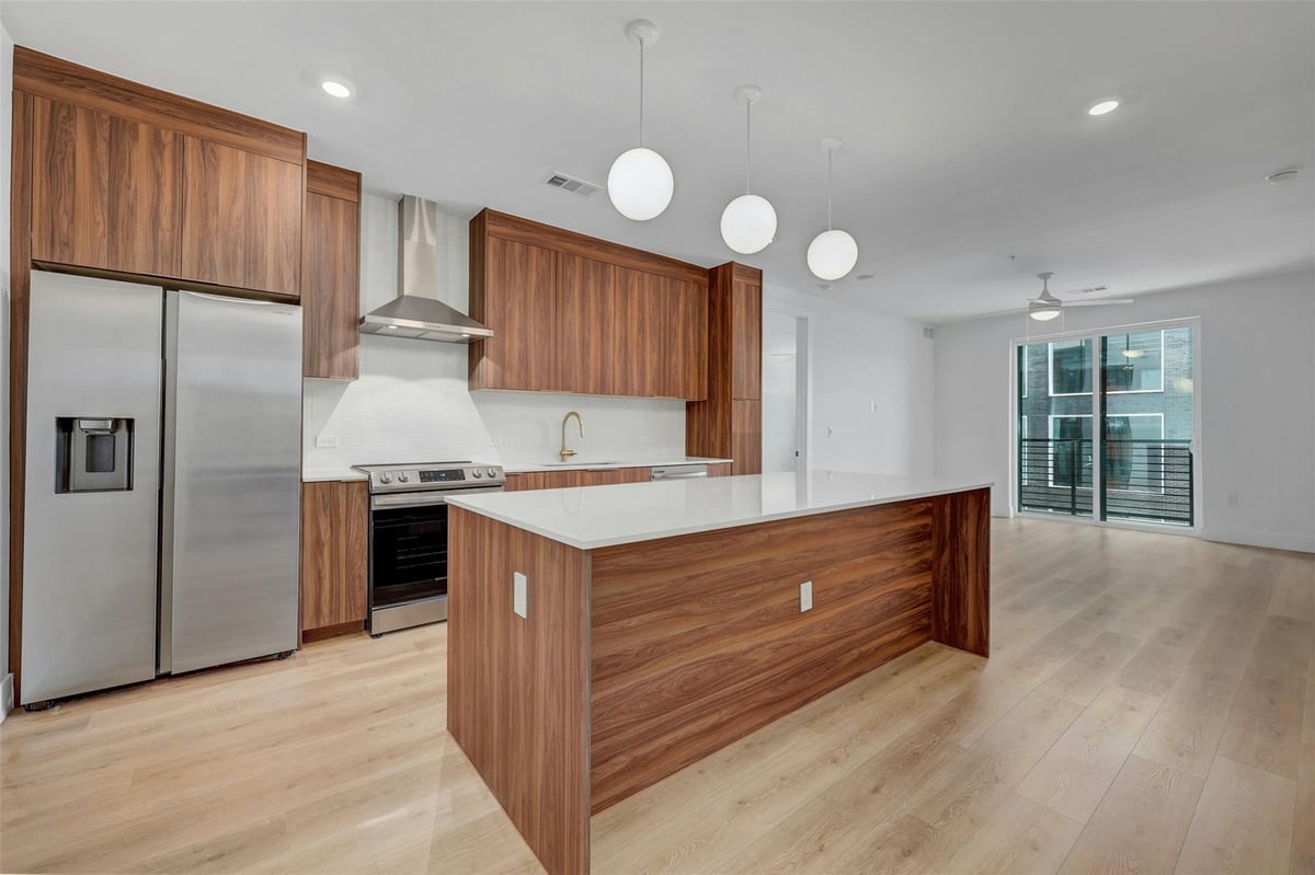 View 1701 Simond Ave Unit #411 in Parkside/Mueller Condos 1701 Simond Ave Unit #411 - property photo 1 - Luxury home in Parkside/Mueller Condos, Austin, TX