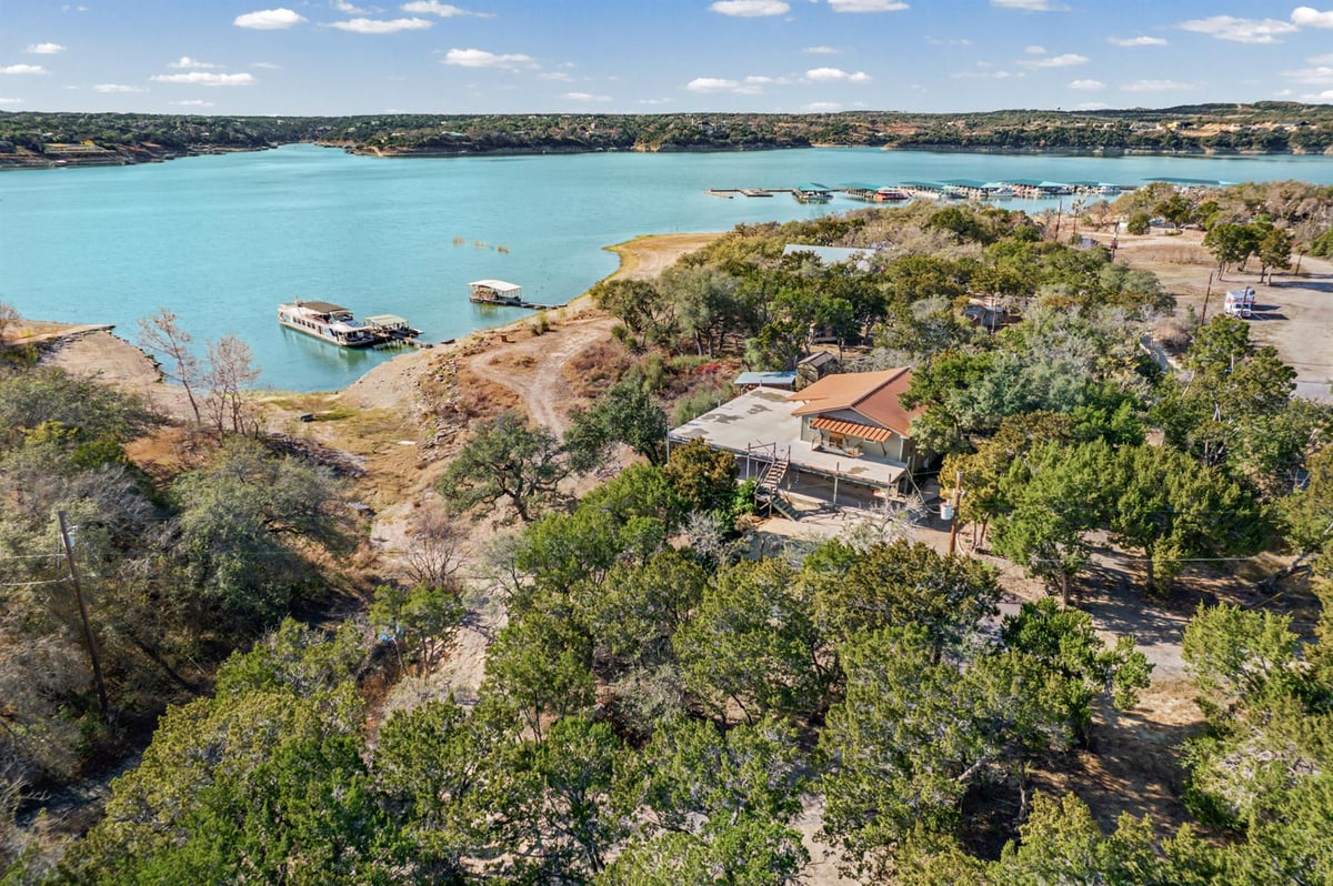 View 17019 Rocky Ridge Rd in JOLLY W T 17019 Rocky Ridge Rd - view with Lake Travis waterfront view - Luxury home in JOLLY W T, Austin, TX