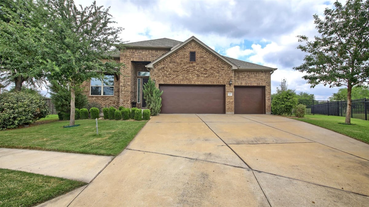 17028 John Michael DR - front exterior - Luxury home in Shadowglen Ph 01 Sec 12-13, Manor, TX