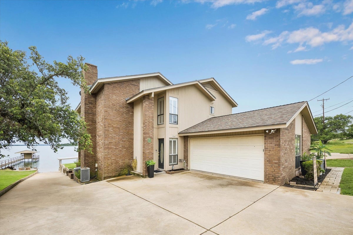 View 1704 County Road 128 in Silver Creek Village 1704 County Road 128 - front exterior - Luxury home in Silver Creek Village, Burnet, TX