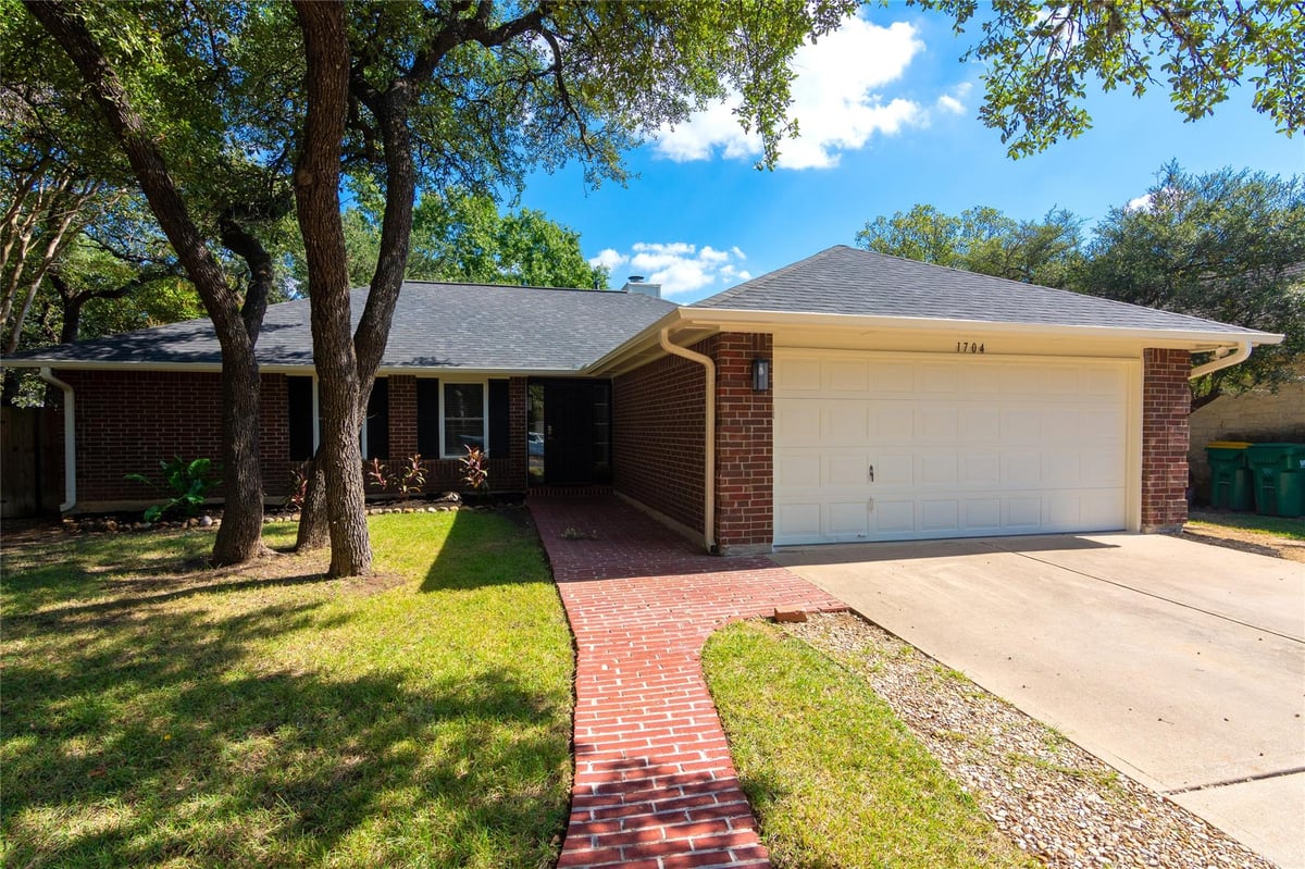 View 1704 Old Mill Rd in Anderson Mill West Sec 05 1704 Old Mill Rd - property photo 1 - Luxury home in Anderson Mill West Sec 05, Cedar Park, TX