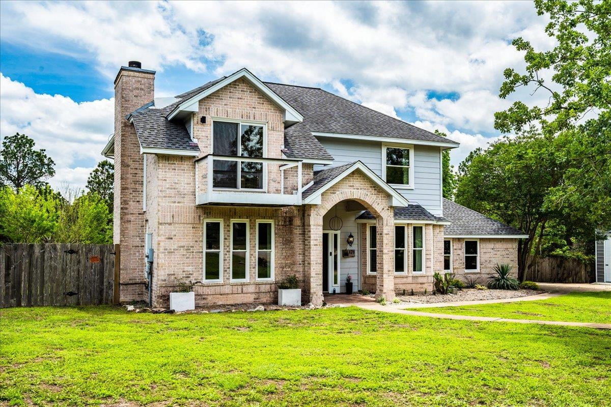 View 171 N Pin Oak XING in The Arbors At Dogwood Creek 171 N Pin Oak XING - front exterior - Luxury home in The Arbors At Dogwood Creek, Elgin, TX