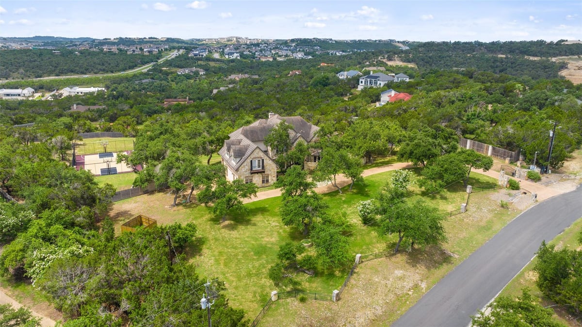 View 17137 Majestic Ridge Rd in Lake Country Estates Sec 02 17137 Majestic Ridge Rd - front exterior - Luxury home in Lake Country Estates Sec 02, Austin, TX