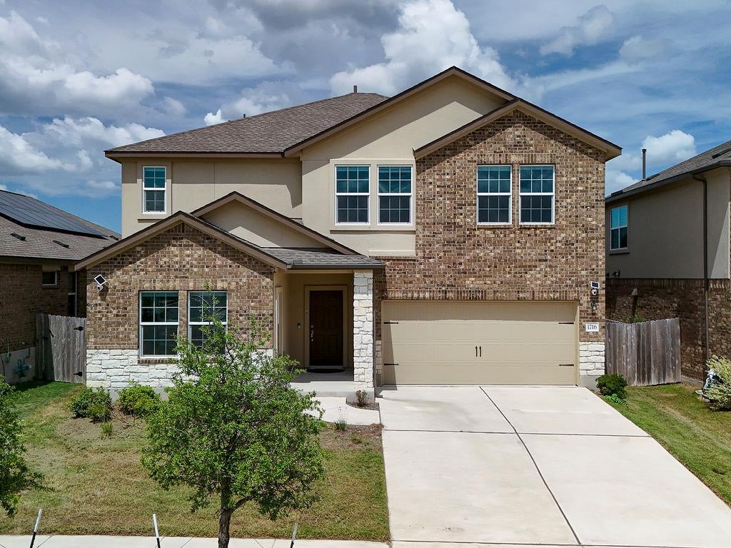 View 1716 Frontenac St in Devine Lake 1716 Frontenac St - front exterior - Luxury home in Devine Lake, Leander, TX
