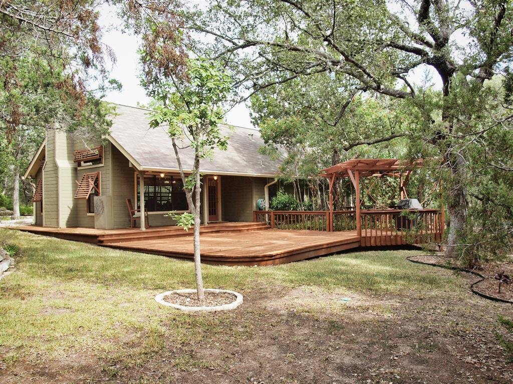 View 17161 W Beach Rd in Woods Lake Travis Sec 02 17161 W Beach Rd - front exterior - Luxury home in Woods Lake Travis Sec 02, Austin, TX
