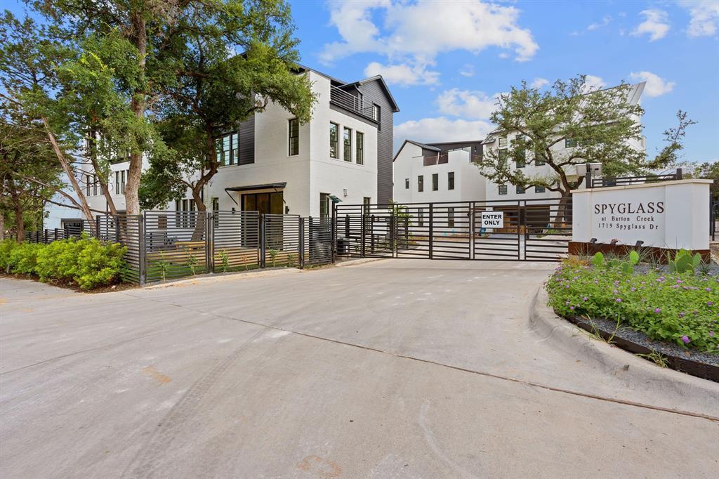 View 1719 Spyglass DR Unit #13 in Spyglass/Barton Crk Condos 1719 Spyglass DR Unit #13 - front exterior - Luxury home in Spyglass/Barton Crk Condos, Austin, TX