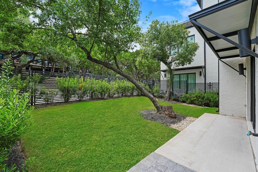 View 1719 Spyglass Dr Unit #17 in Spyglass 1719 Spyglass Dr Unit #17 - front exterior - Luxury home in Spyglass, Austin, TX