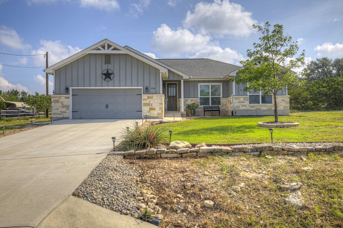 View 1720 Rocky Ridge LOOP in Rocky Creek Ranch 5 1720 Rocky Ridge LOOP - front exterior - Luxury home in Rocky Creek Ranch 5, Canyon Lake, TX