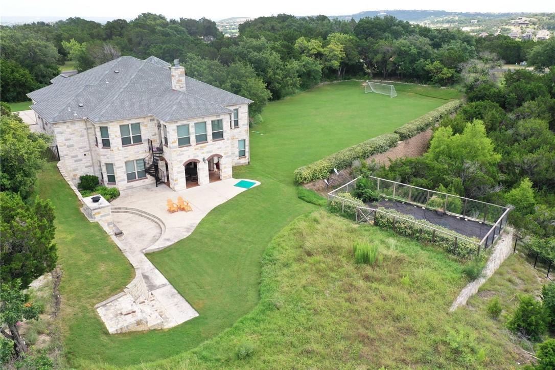 View 17207 Raynham Hill Dr in Lake Country Estates 17207 Raynham Hill Dr - aerial view with aerial luxury residence and large lawn - Luxury home in Lake Country Estates, Aus...