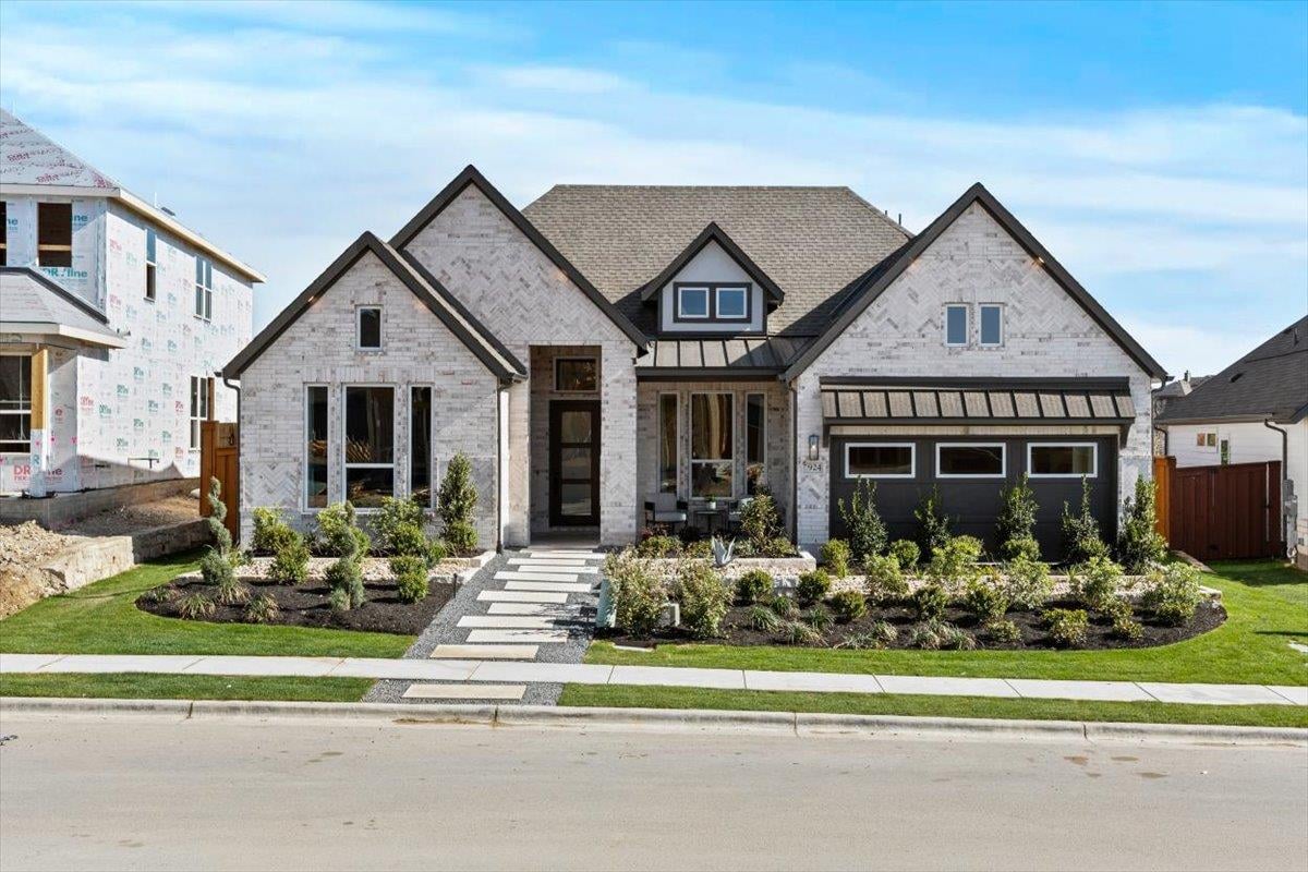 View 17212 Hope Bergman Rd in Grove at Blackhawk 17212 Hope Bergman Rd - front exterior - Luxury home in Grove at Blackhawk, Pflugerville, TX