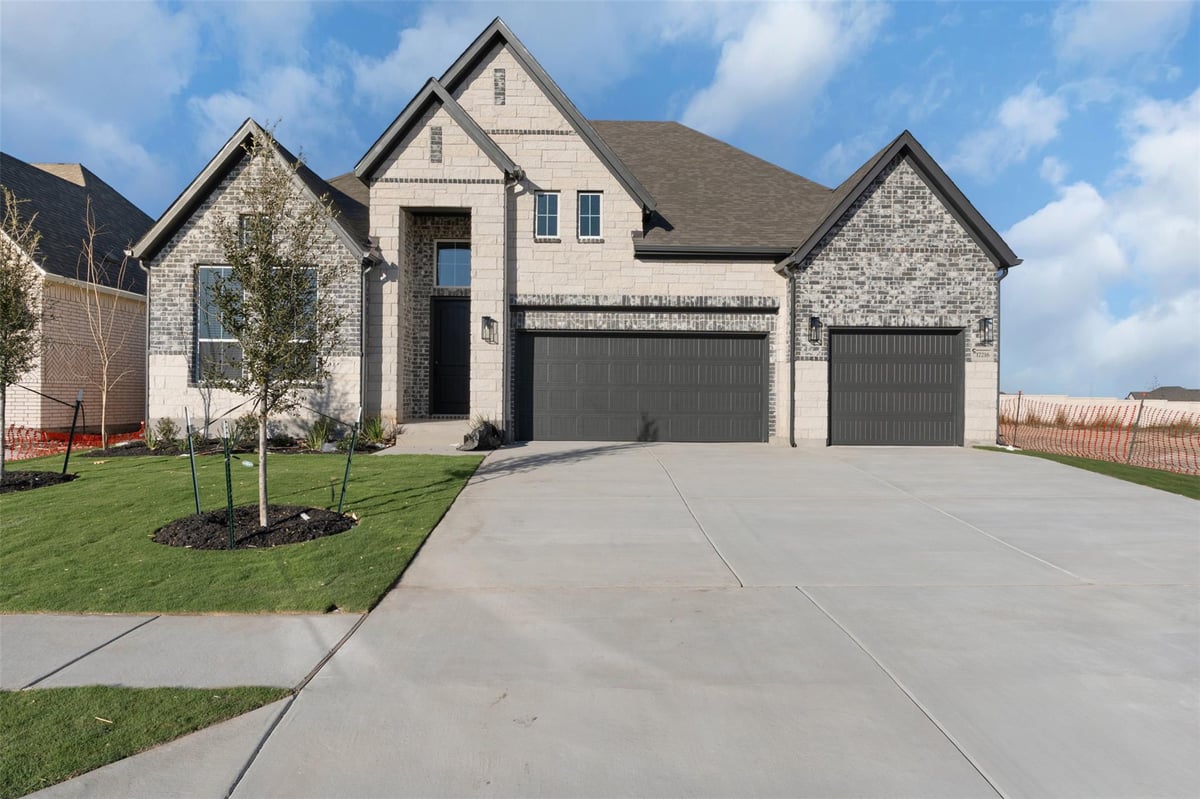 View 17216 Hope Bergman Rd in Grove at Blackhawk 17216 Hope Bergman Rd - front exterior - Luxury home in Grove at Blackhawk, Pflugerville, TX