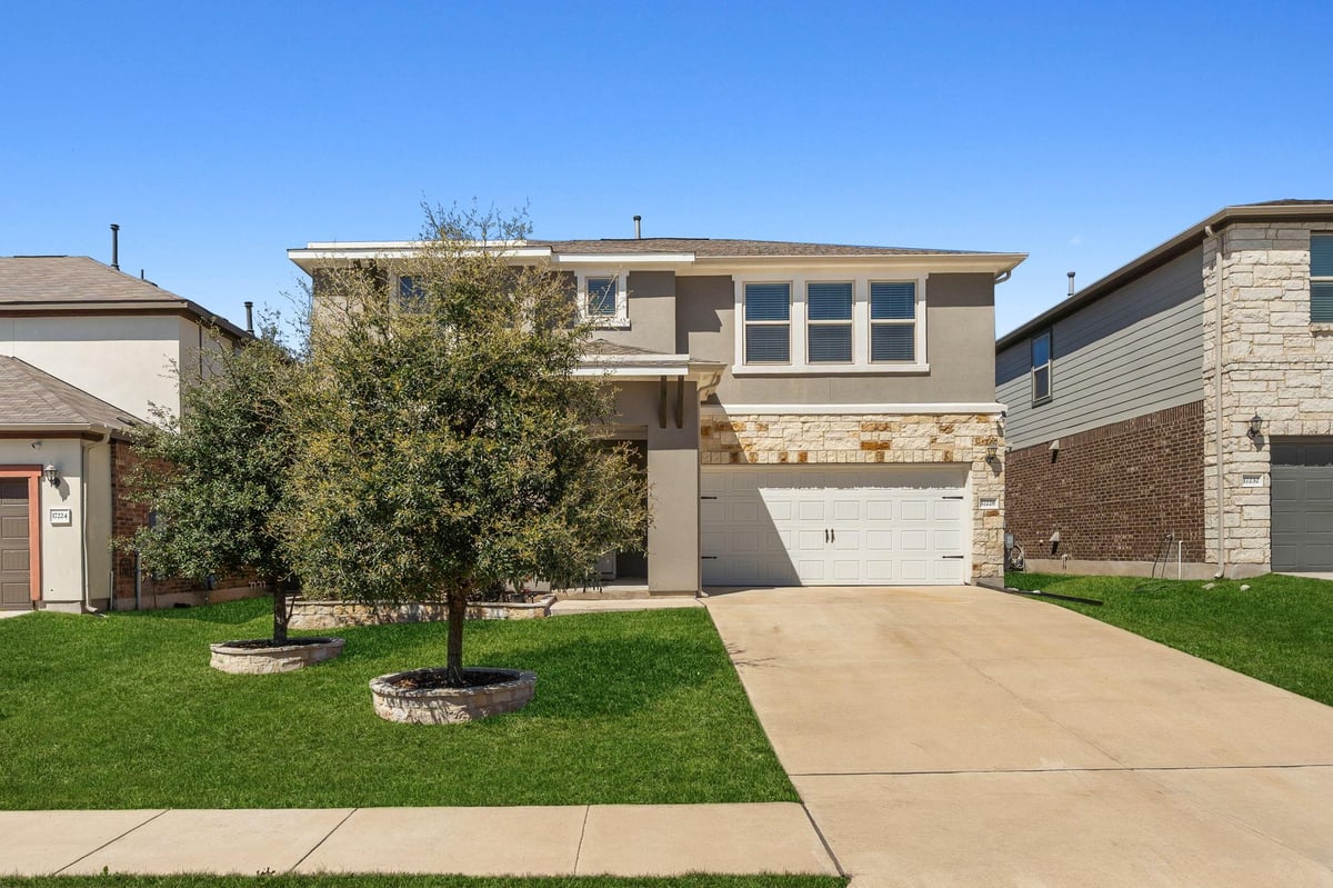 View 17228 Lathrop Ave in Carmel 17228 Lathrop Ave - front exterior - Luxury home in Carmel, Pflugerville, TX