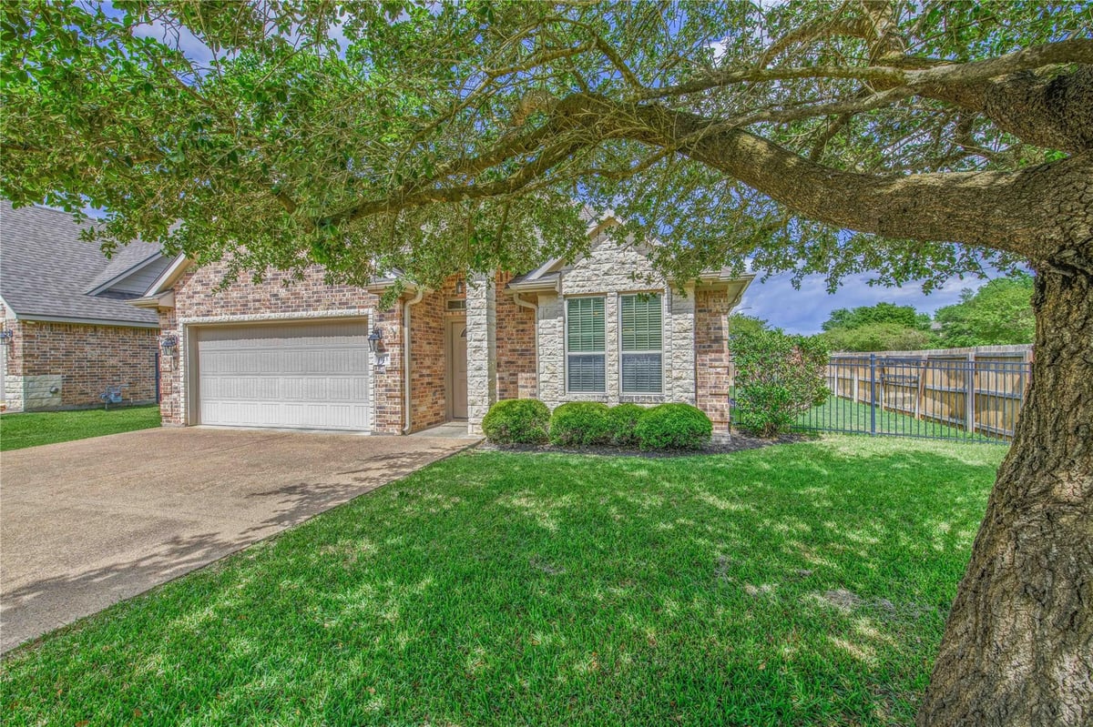 View 1723 Creekside Cir in Lakeside Village Ph 02 1723 Creekside Cir - front exterior - Luxury home in Lakeside Village Ph 02, College Station, TX