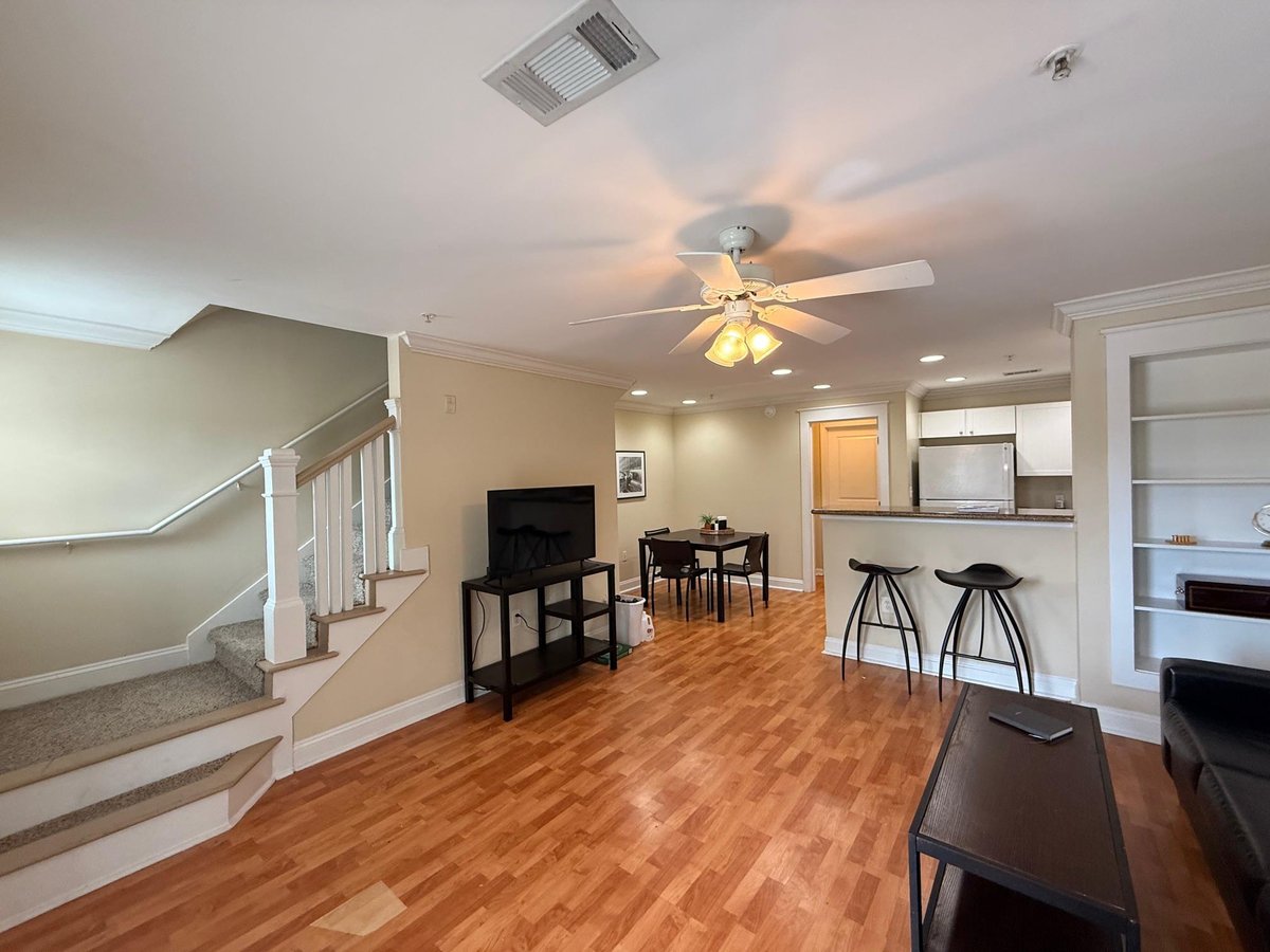 Living area at 1725 Harvey Mitchell Pkwy S Unit #1430 - 3 bed 3 bath home