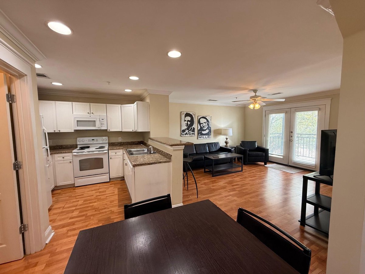 Primary bedroom at 1725 Harvey Mitchell Pkwy S Unit #1430 - 3 bed 3 bath home