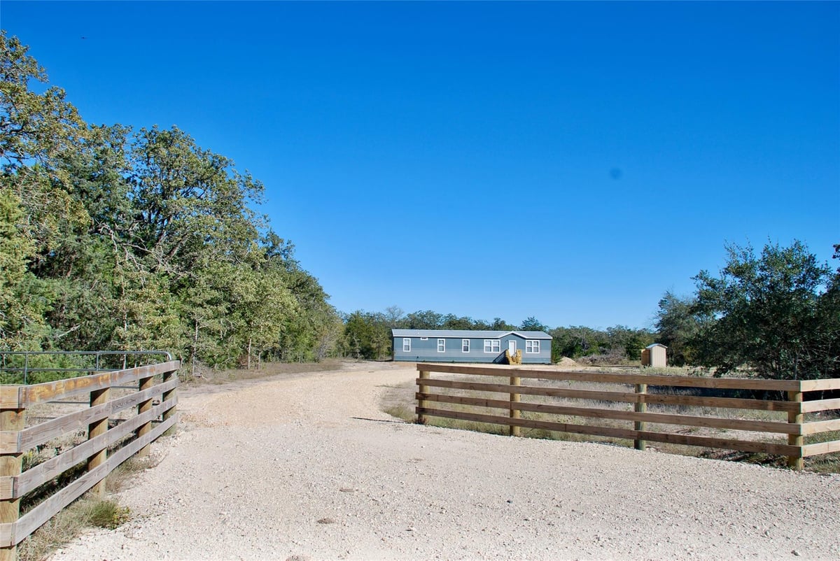 View 1727 Davis Rd in Bbb & C RR Co Surv A-144 1727 Davis Rd - property photo 1 - Luxury home in Bbb & C RR Co Surv A-144, Muldoon, TX