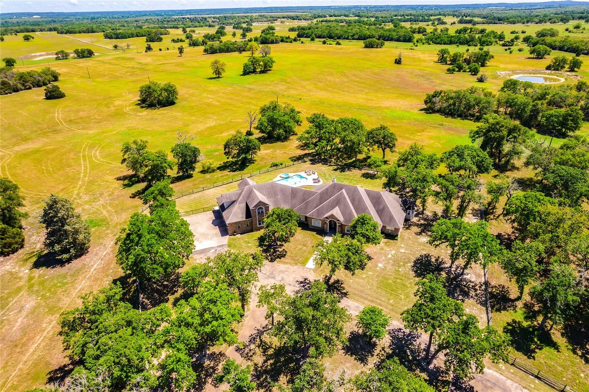 View 17270 FM 112 in Countryside Estates 17270 FM 112 - front exterior with 17270 FM 112 in Thrall - Luxury home in Countryside Estates, Thrall, TX