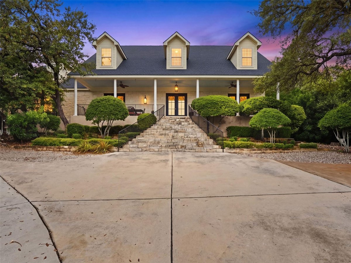 View 173 Falling Hills in River Chase 173 Falling Hills - front exterior - Luxury home in River Chase, New Braunfels, TX