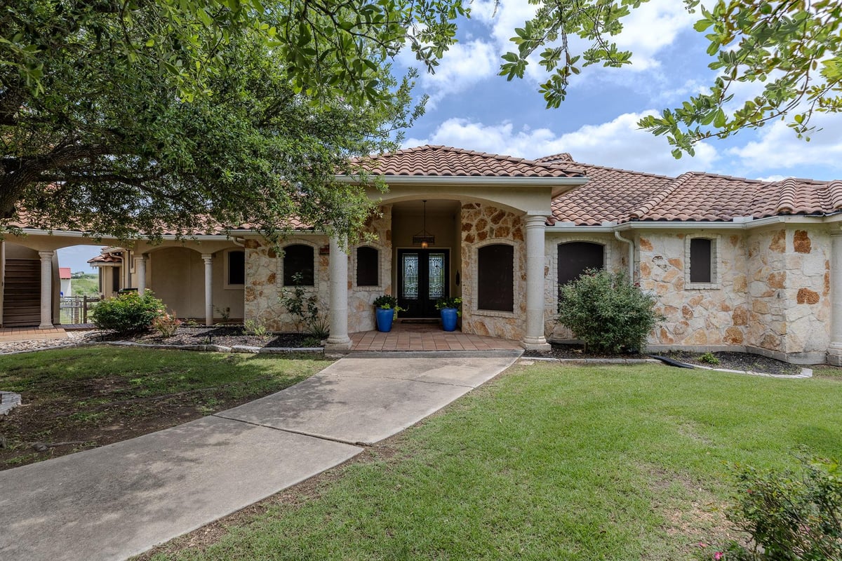 17308 Saint Therese Rd - front exterior - Luxury home in Bella Vista At Cottonwood Creek, Manor, TX