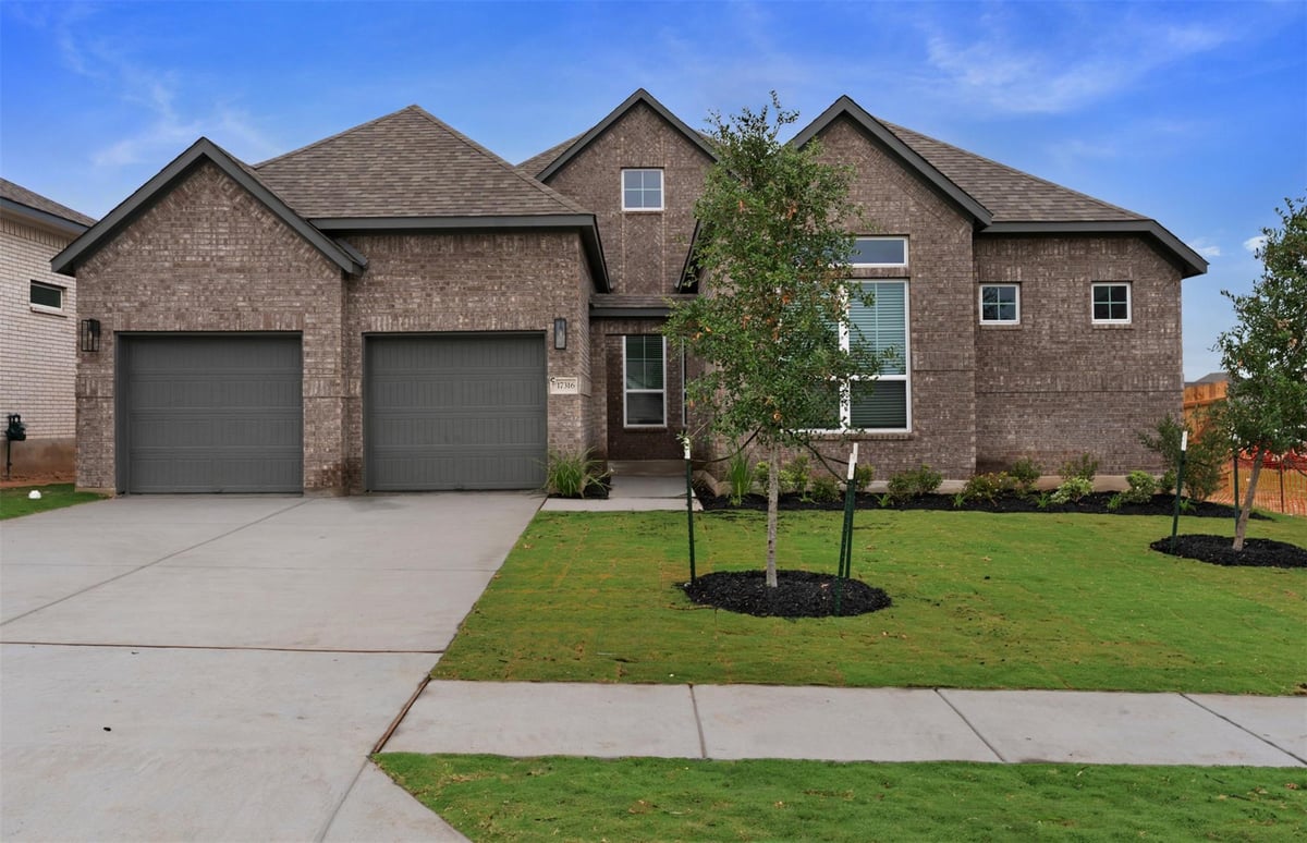 View 17316 Joy Kay Cotton ST in Grove at Blackhawk 17316 Joy Kay Cotton ST - front exterior - Luxury home in Grove at Blackhawk, Pflugerville, TX