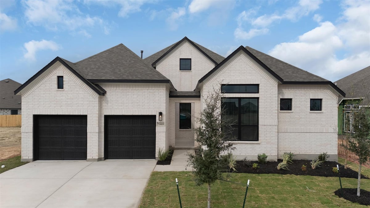 View 17316 Joy Kay Cotton St in Grove at Blackhawk 17316 Joy Kay Cotton St - front exterior - Luxury home in Grove at Blackhawk, Pflugerville, TX