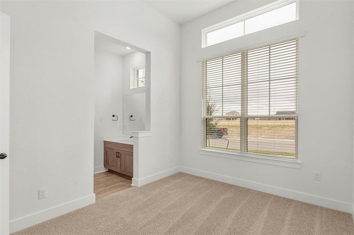 Primary bedroom at 17316 Joy Kay Cotton St - 4 bed 3 bath home