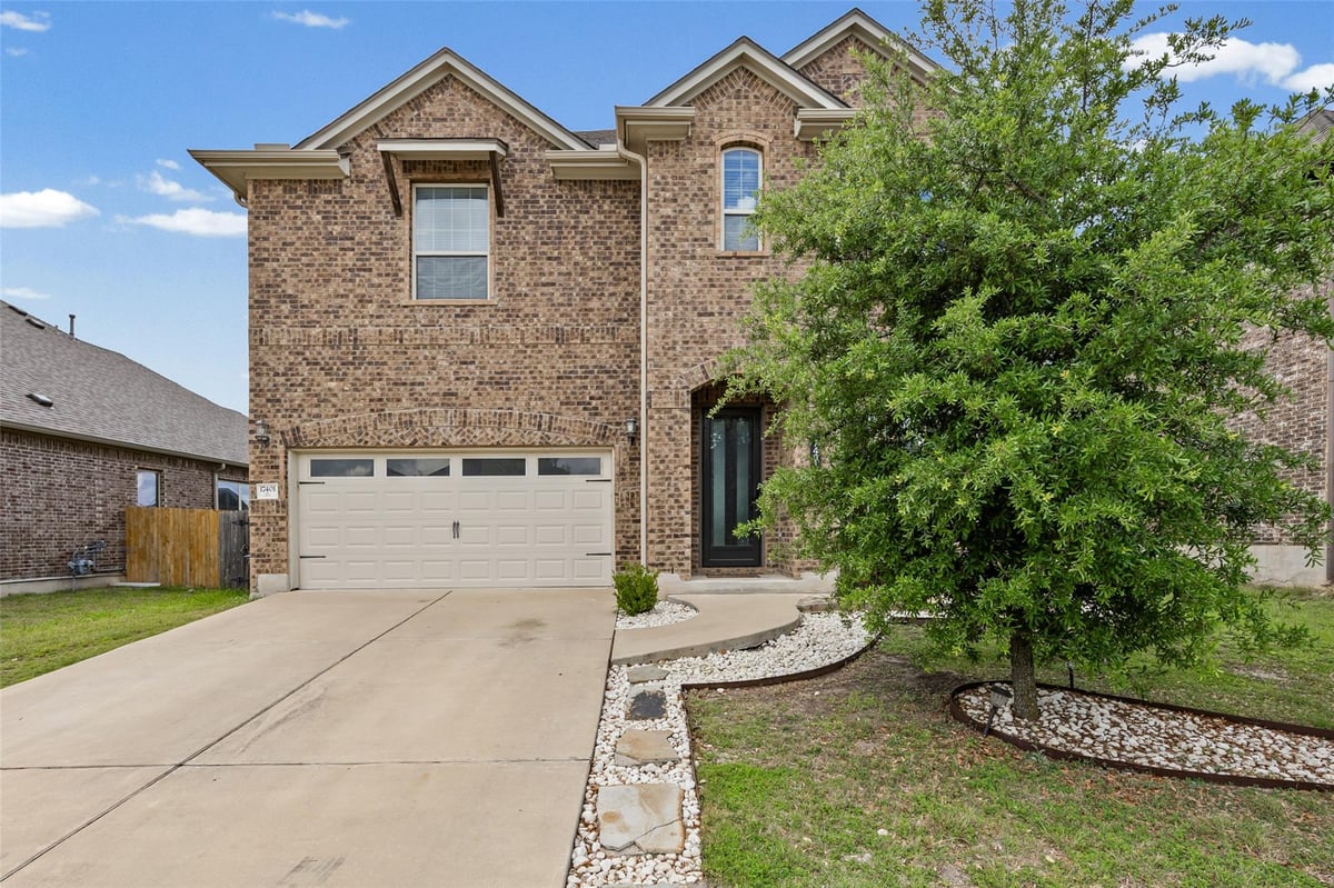 View 17401 Silent Harbor Loop in Villages Of Hidden Lake Ph 6a 17401 Silent Harbor Loop - front exterior - Luxury home in Villages Of Hidden Lake Ph 6a, Pflugerville, TX