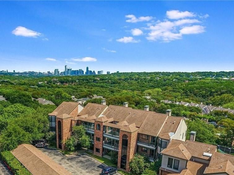 Living area at 1741 Spyglass Dr Unit #2-102 - One Barton Place Condo, Austin, TX