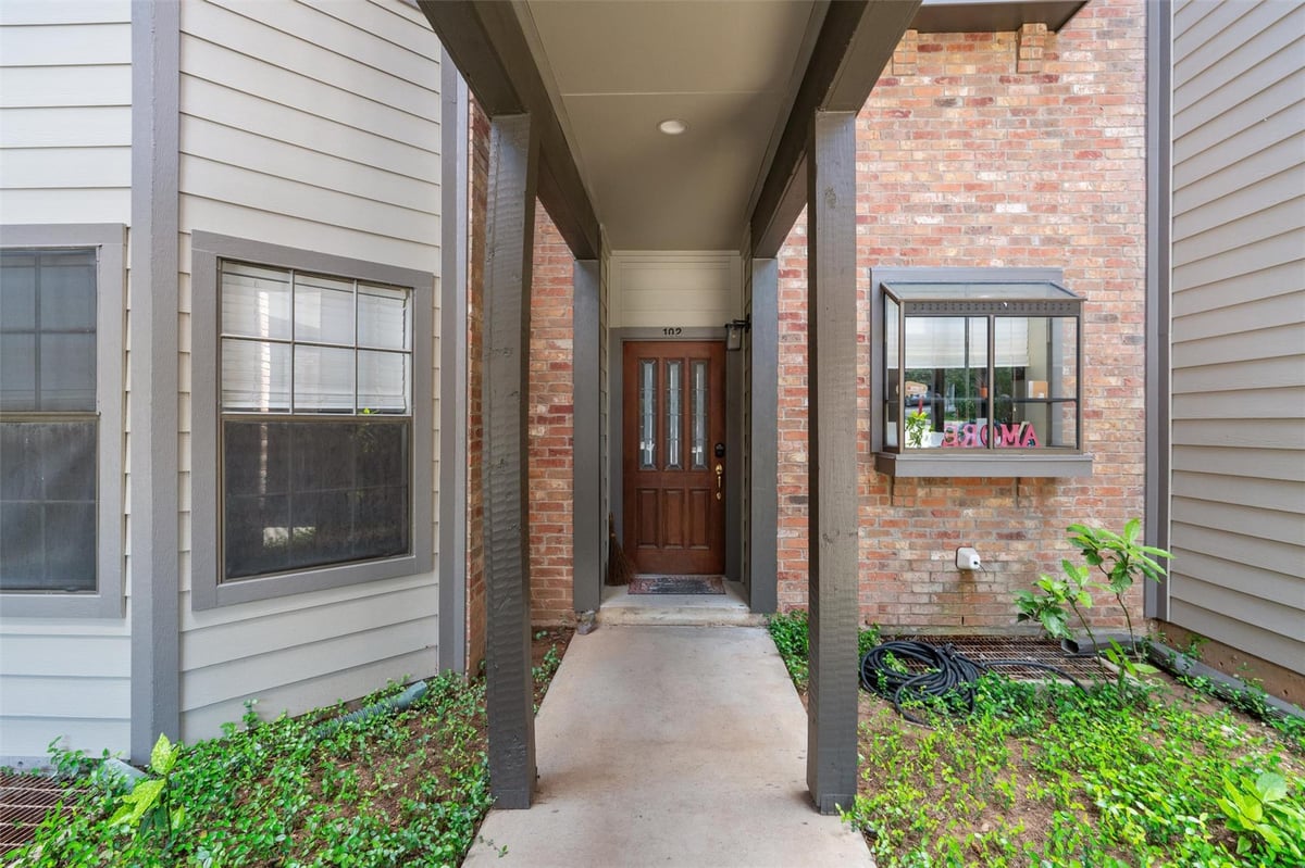 Kitchen at 1741 Spyglass Dr Unit #2-102 - One Barton Place Condo, Austin, TX