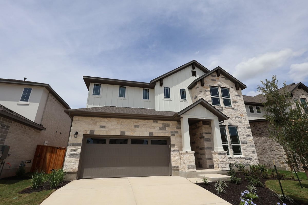 View 1746 Sawmill Crossing in Homestead at Old Settlers Park 1746 Sawmill Crossing - front exterior - Luxury home in Homestead at Old Settlers Park, Round Rock, TX