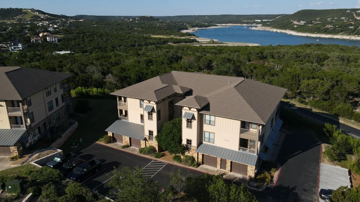 View 17700 Edgewood WAY Unit #202 in Hollows Condo Hilltop VI 17700 Edgewood WAY Unit #202 - front exterior - Luxury home in Hollows Condo Hilltop VI, Jonestown, TX