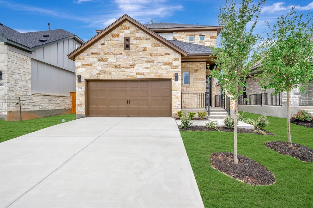 View 178 Grayson Elm Pass in Heritage 178 Grayson Elm Pass - front exterior - Luxury home in Heritage, Dripping Springs, TX