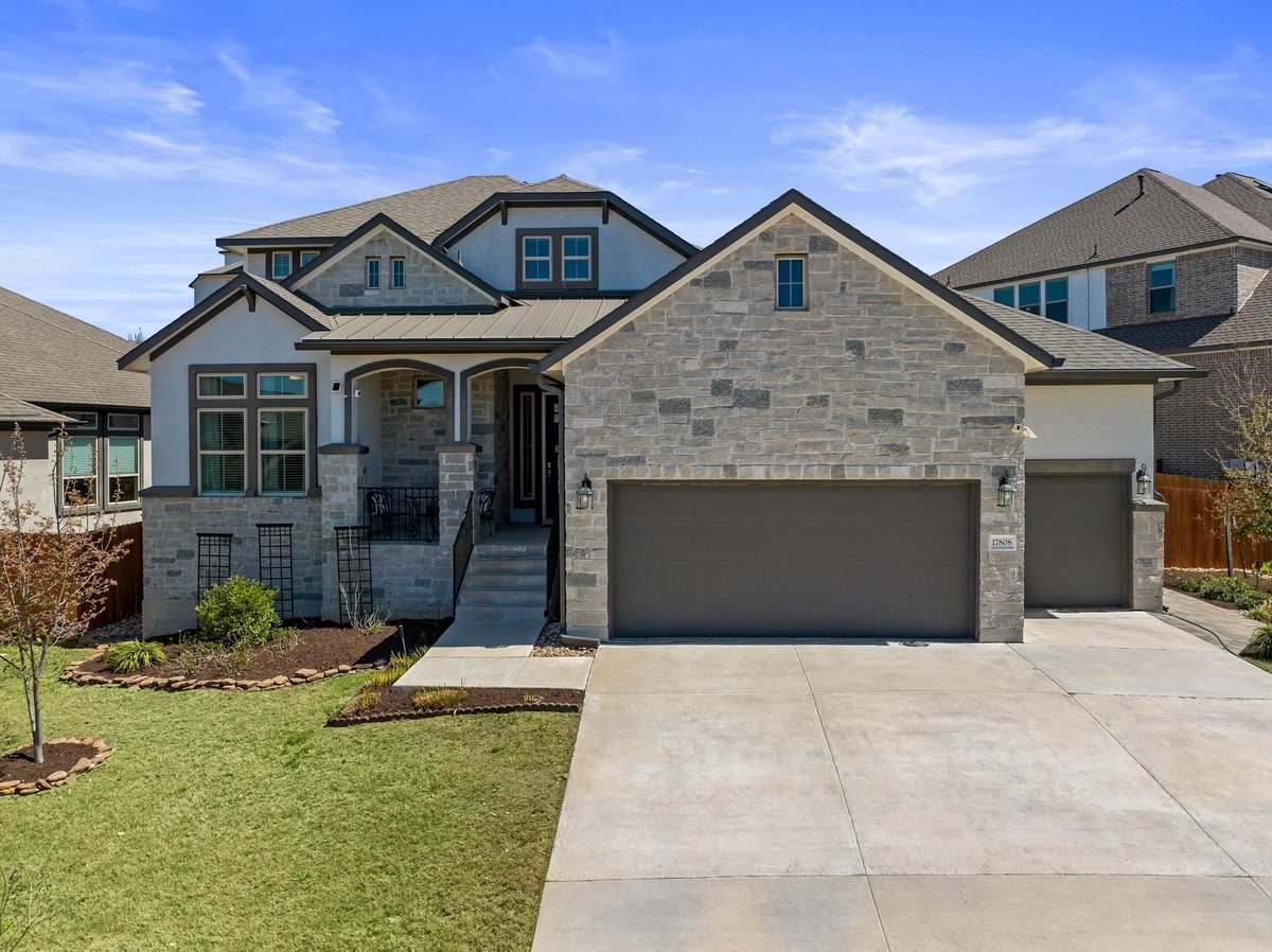 View 17808 Limestone Spring LN in Sweetwater Ranch 17808 Limestone Spring LN - front exterior - Luxury home in Sweetwater Ranch, Austin, TX